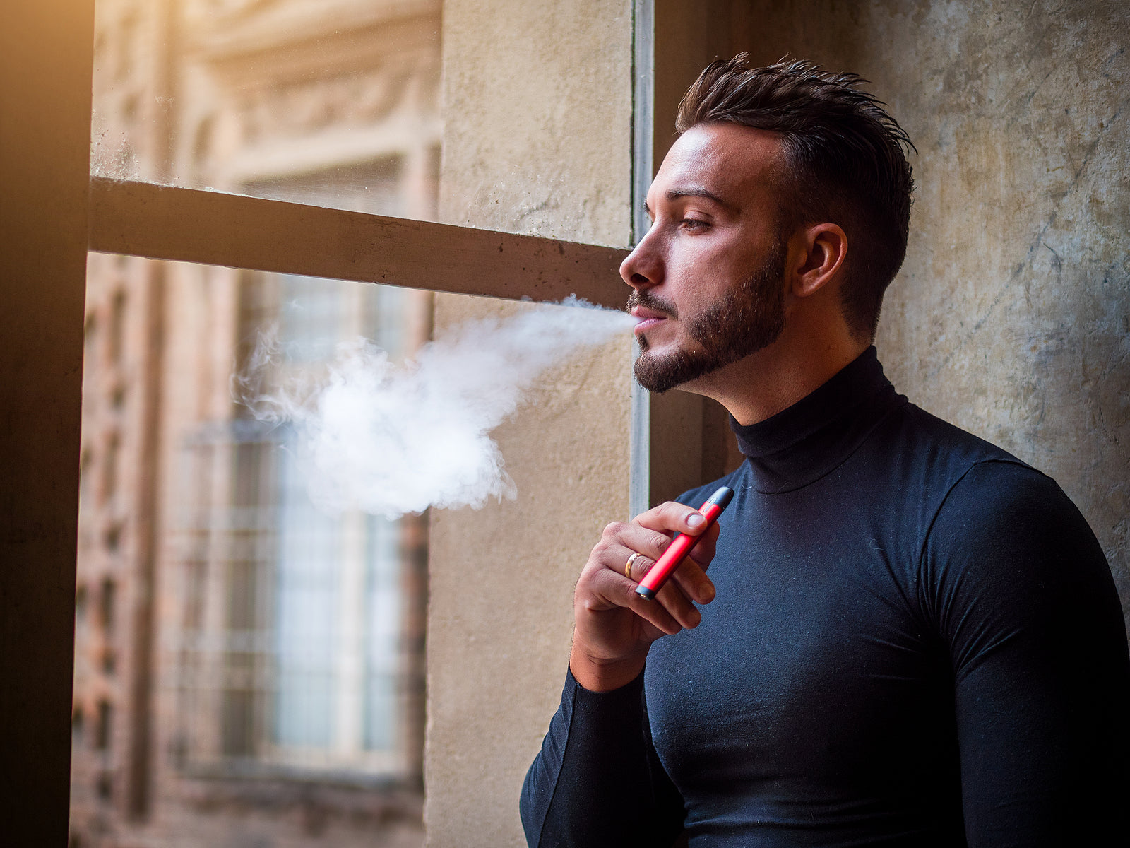 man vaping